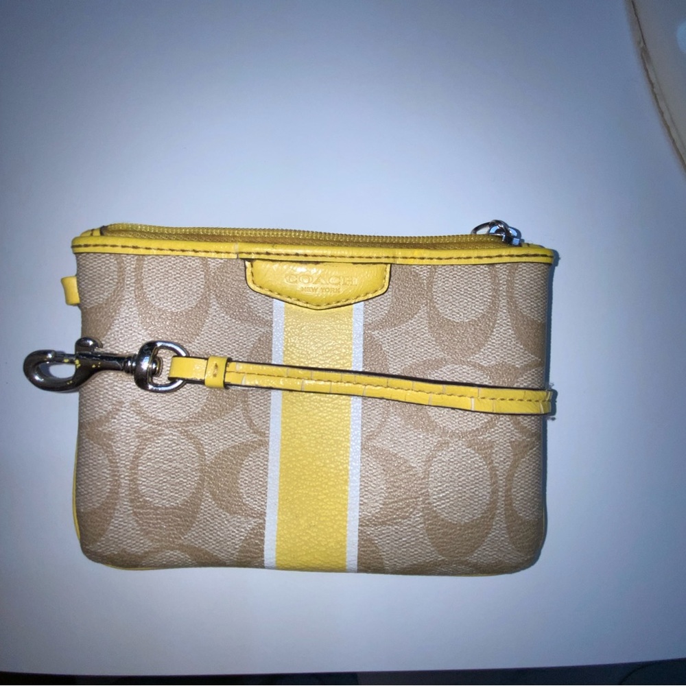 Small yellow Coach clutch